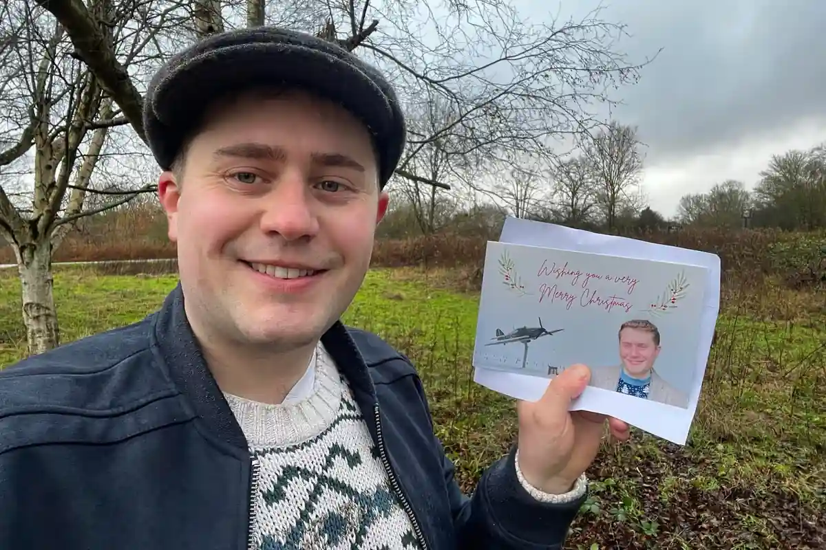 Cllr Tom Bromwich delivering cards